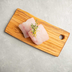 Grouper Fillet garnished on cutting board by FishFinery