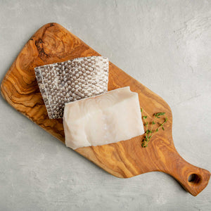 
                
                    Load image into Gallery viewer, Chilean Sea Bass Fillet on Cutting Board by FishFinery
                
            