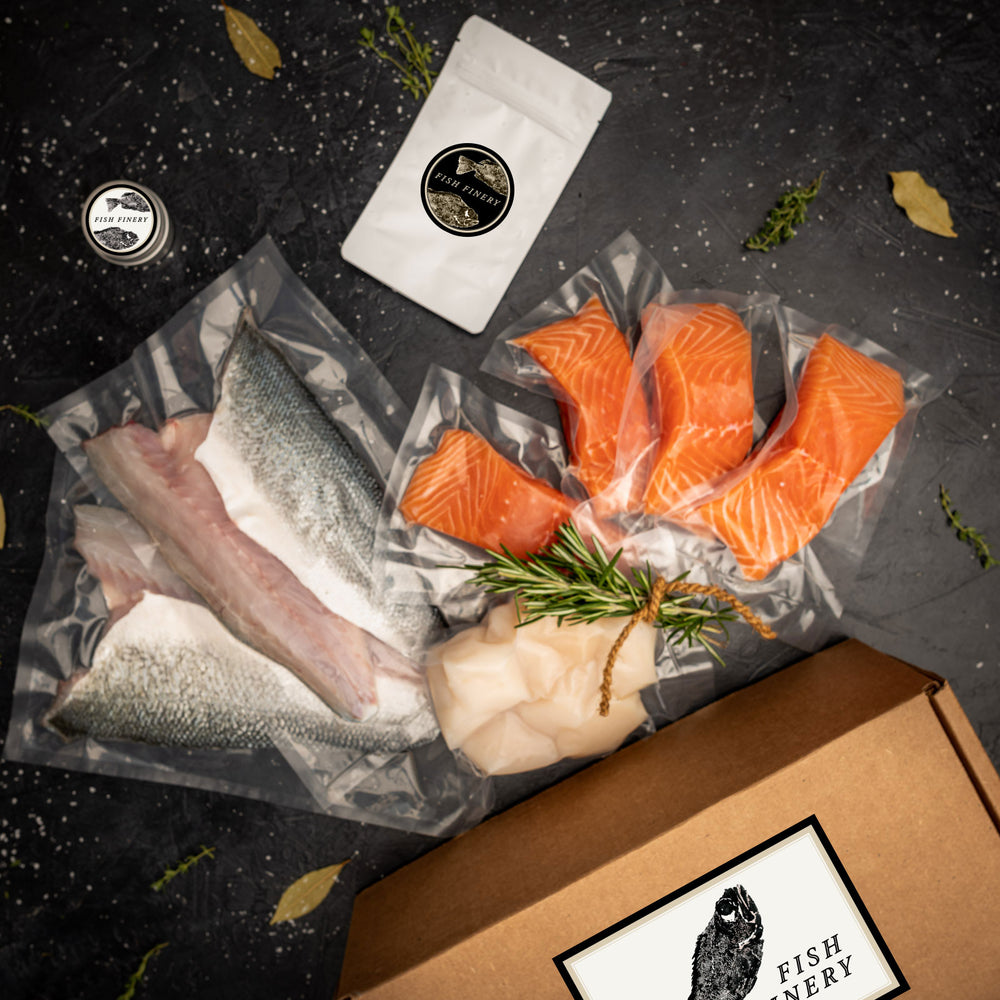 FishFinery Seasonal Deluxe Box includes Salmon Fillets, Bronzino Fillets, Diver Scallops, Dry Rub & Marinade